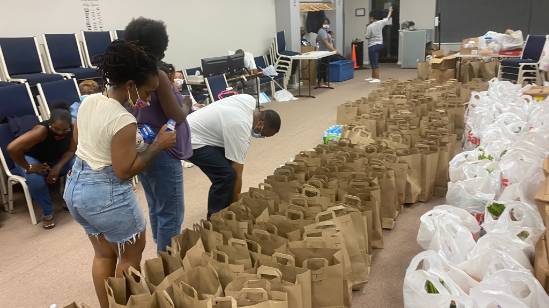 interactive community collaboration, excited expression, creating art, photorealistic, park setting with trees and flowers, highly detailed, birds flying, wide aperture, pastel tones, golden hour lighting, shot with a 50mm lens.